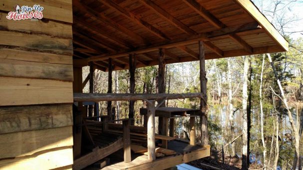 DIY wood cabin with front porch