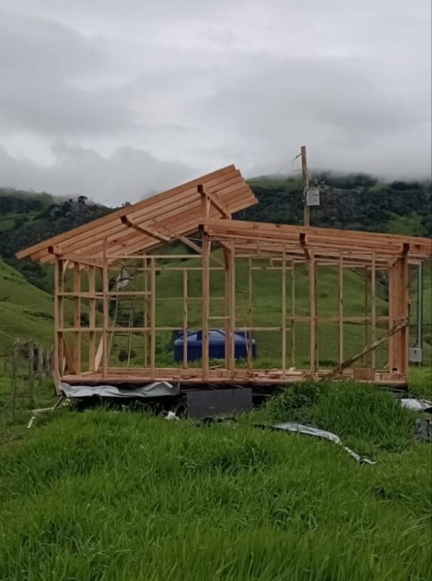 Timber frame tiny cabin under construction built from DIY cabin plans