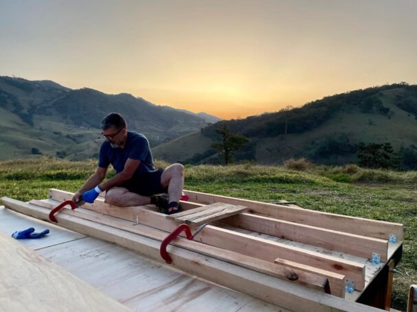 DIY tiny house floor frame construction in remote off-grid area