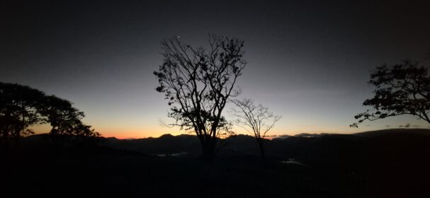Twilight mountain view from off-grid tiny cabin location